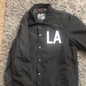 Black long sleeve windbreaker “LA” jacket